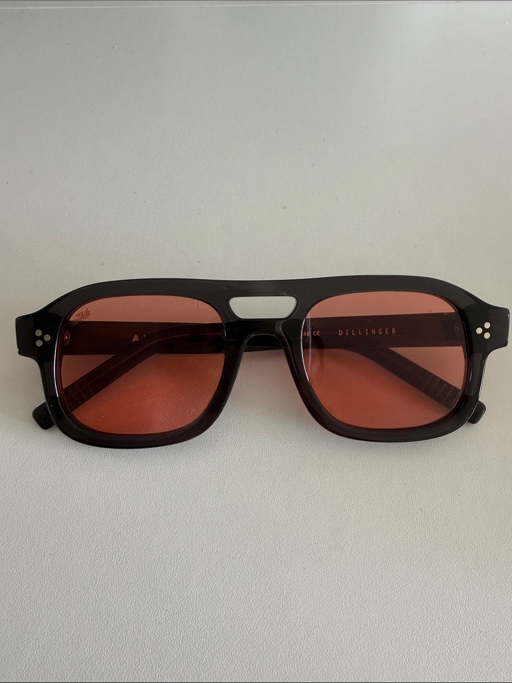 Akila Dillinger Women's Black Frame Sunglasses with Red Lenses